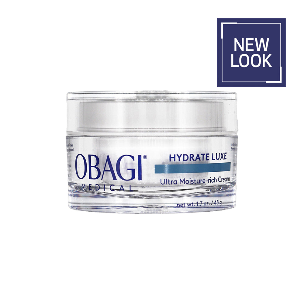 A jar of Obagi Medical Hydrate Luxe Ultra Moisture-rich Cream on a white background, featuring a dark blue 'NEW LOOK' badge in the top right corner.